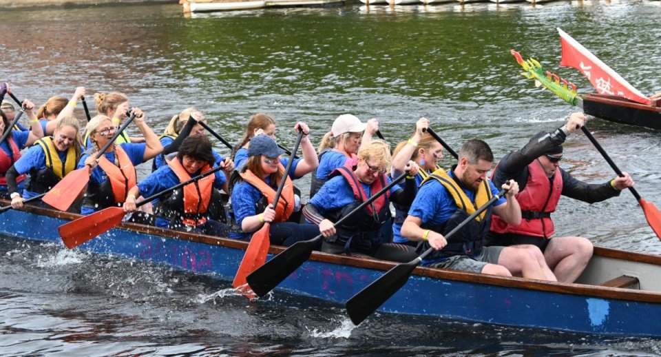 People rowing in Dragon Boat Race