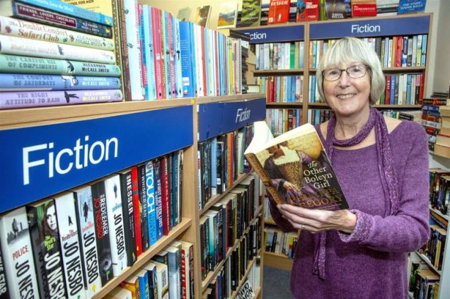 Hospice volunteer in bookshop